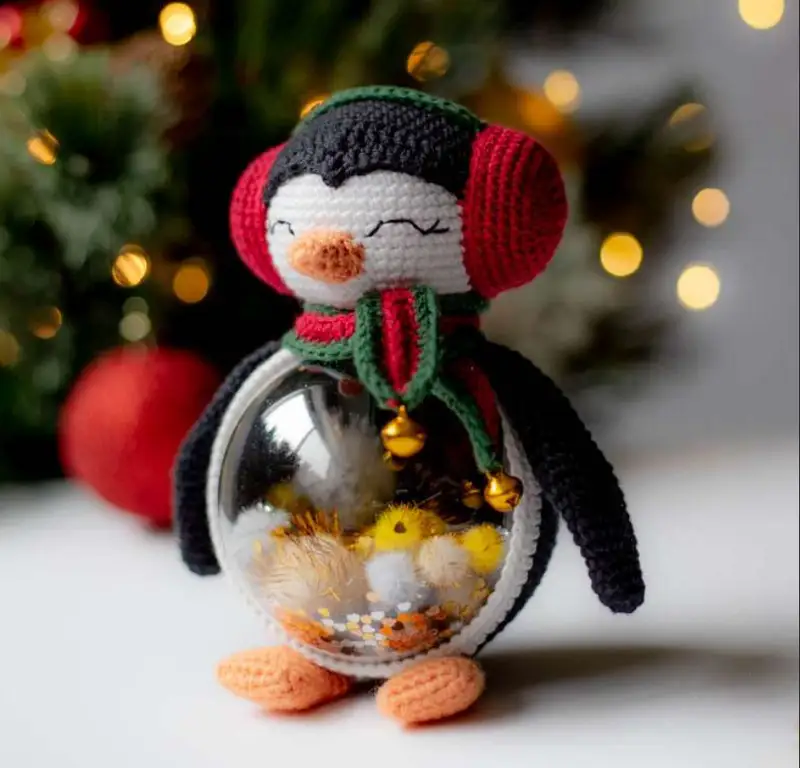 Complimentary Intermediate crochet pattern: Globe Penguin Christmas Amigurumi Pattern - Simple to follow guide