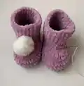 Baby Plush Bootie with Pompoms Crochet Pattern step 4 - final assembly and finishing